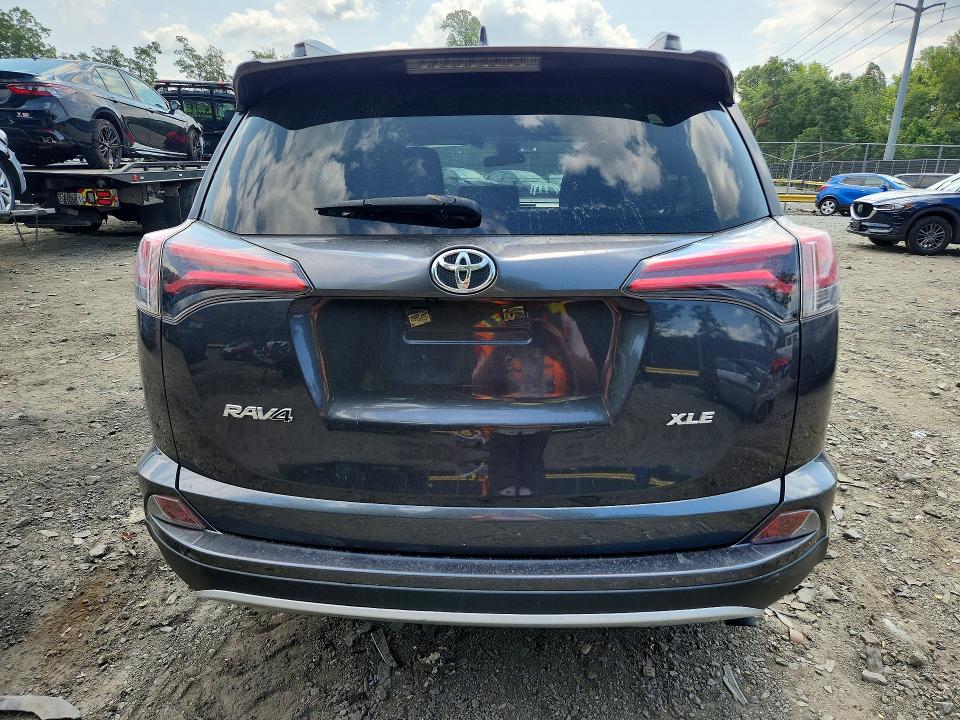 Photo 6 from auction – 2018 TOYOTA RAV4 with VIN JTMWFREV2JJ187528