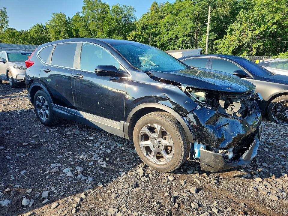 Photo 4 from auction – 2018 HONDA CR-V with VIN 2HKRW2H53JH677470