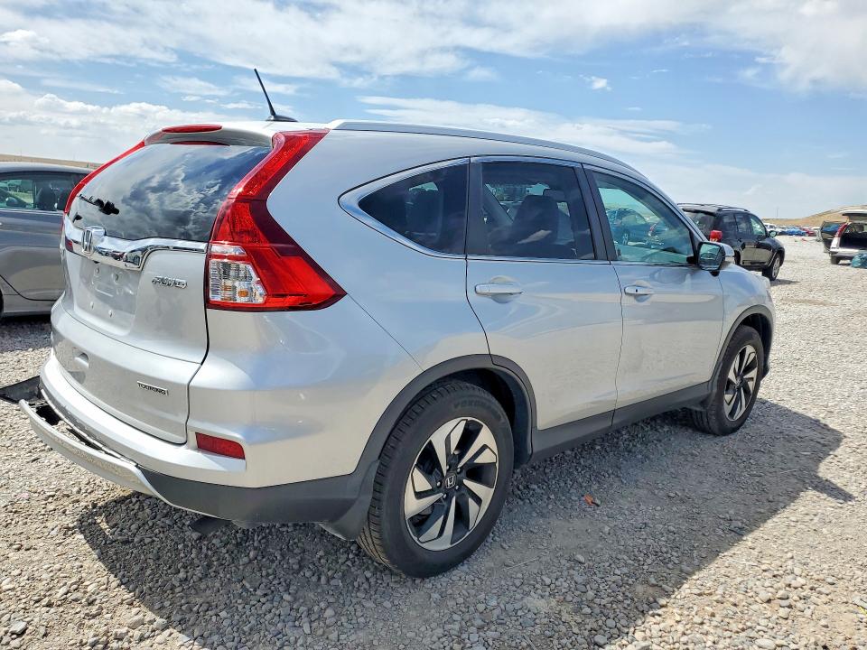 Photo 3 from auction – 2016 HONDA CR-V with VIN 5J6RM4H98GL033157