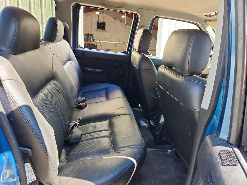 Photo 10 from auction – 2003 NISSAN FRONTIER with VIN 1N6ED27Y63C436563