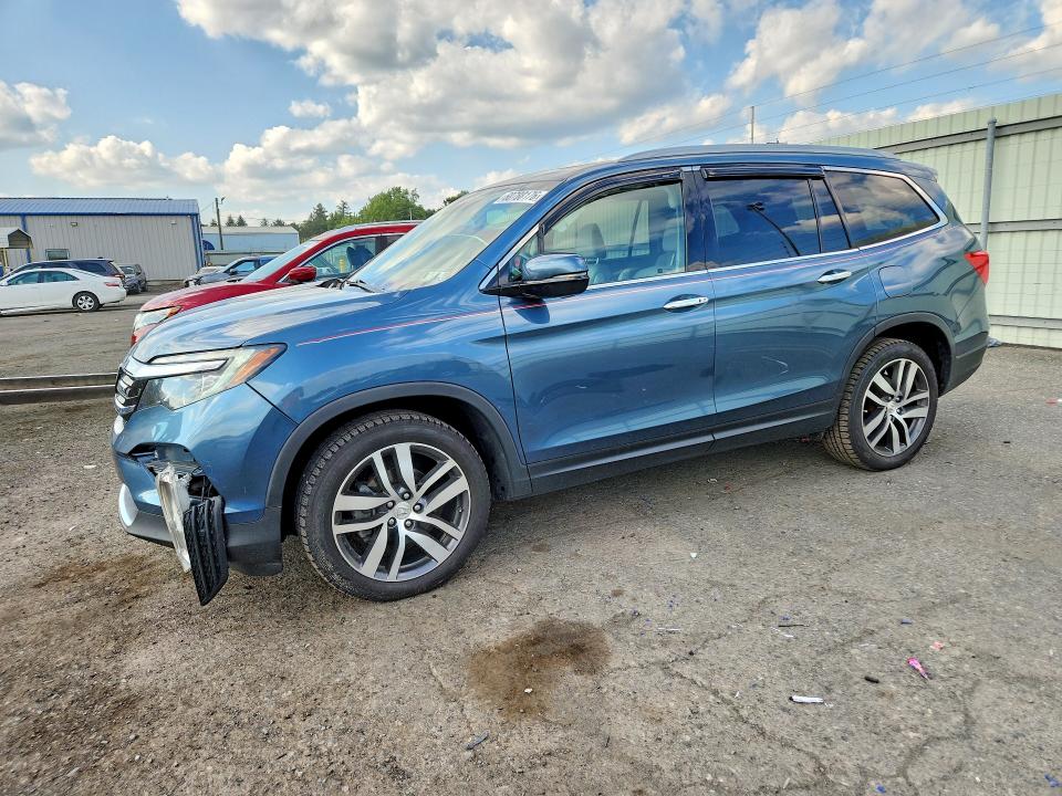 HONDA PILOT 2016 with VIN 5FNYF6H02GB127157 - Photo from auction
