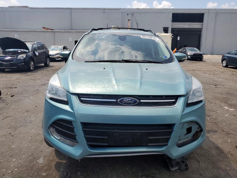 Photo 5 from auction – 2013 FORD ESCAPE with VIN 1FMCU9H97DUA91447
