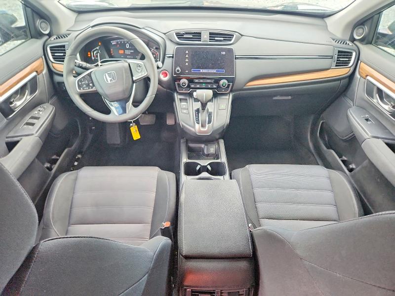 Photo 8 from auction – 2018 HONDA CR-V with VIN 7FARW1H51JE040459