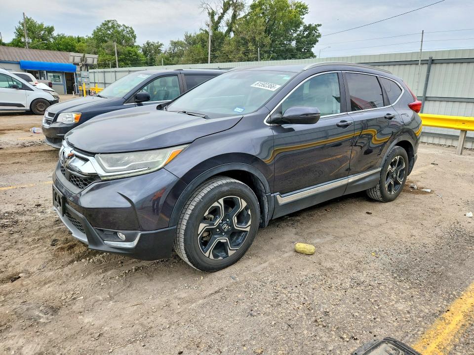 Photo 1 from auction – 2017 HONDA CR-V with VIN 5J6RW2H97HL014230