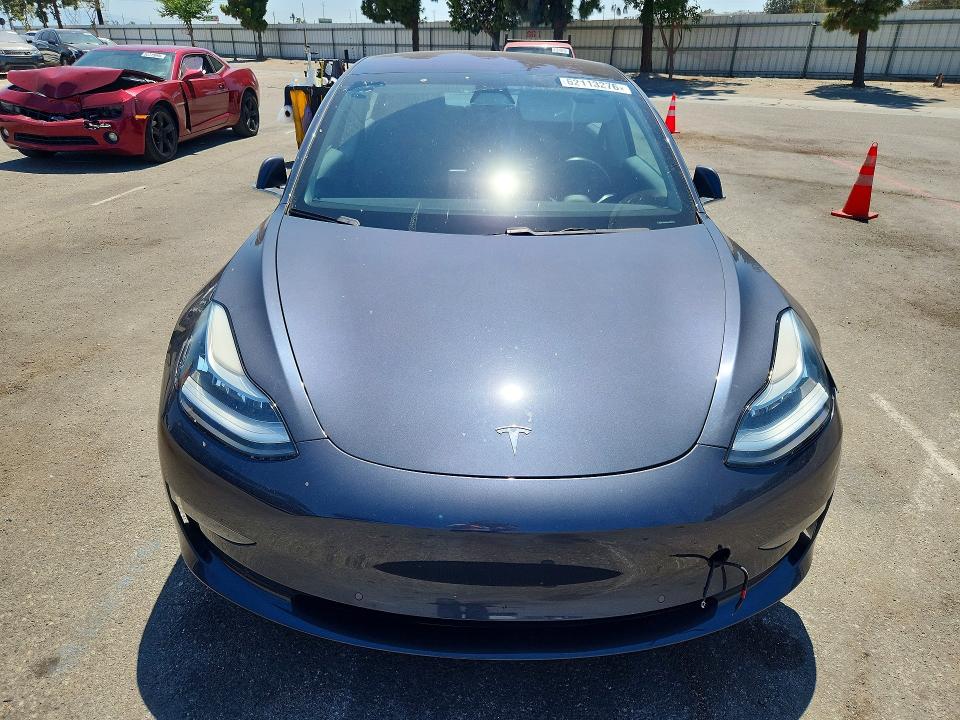 Photo 5 from auction – 2018 TESLA MODEL 3 with VIN 5YJ3E1EA6JF077741