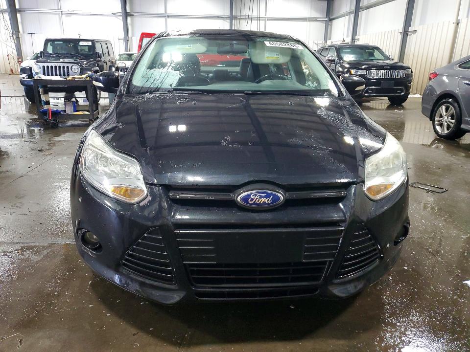 Photo 5 from auction – 2014 FORD FOCUS with VIN 1FADP3F20EL129455