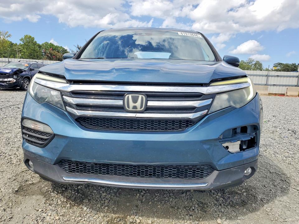 Photo 5 from auction – 2016 HONDA PILOT with VIN 5FNYF6H04GB070282