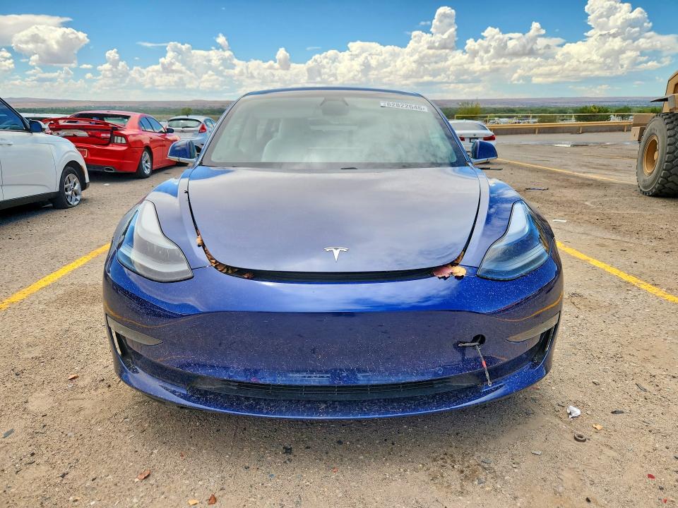 Photo 5 from auction – 2018 TESLA MODEL 3 with VIN 5YJ3E1EB1JF097839