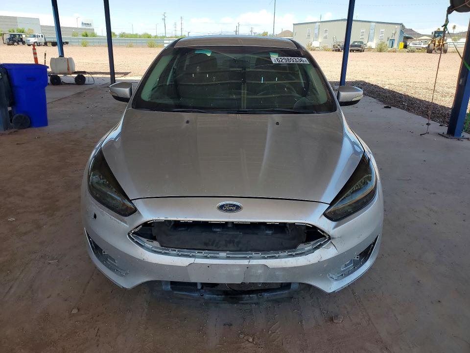 Photo 5 from auction – 2016 FORD FOCUS with VIN 1FADP3F27GL268646