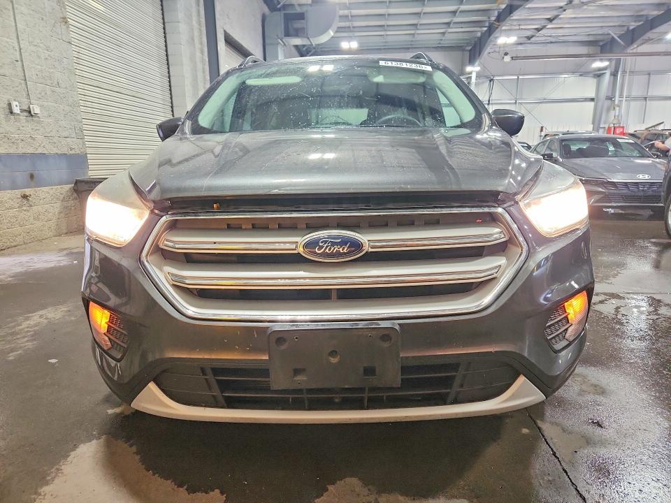 Photo 5 from auction – 2018 FORD ESCAPE with VIN 1FMCU0GD1JUA85379