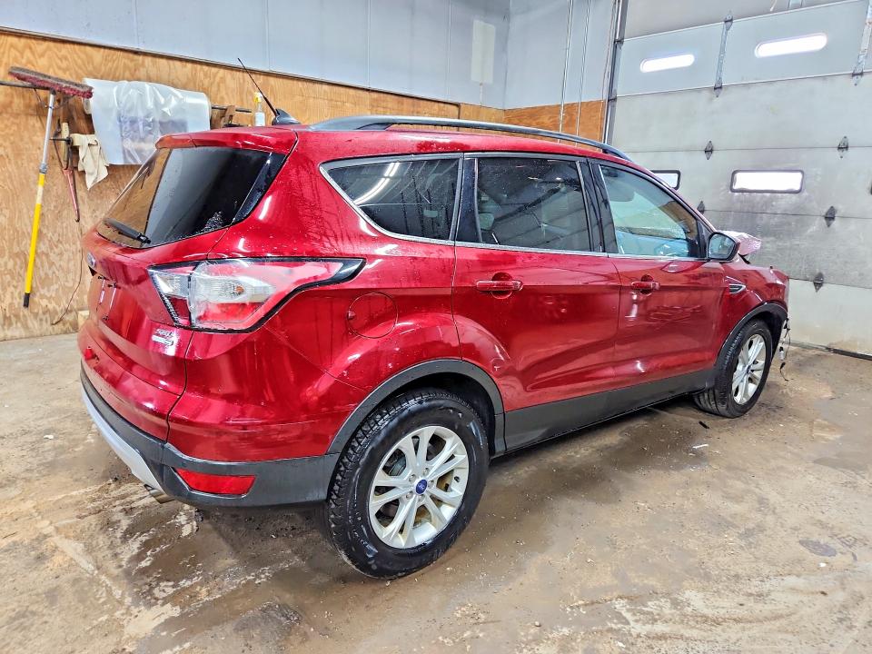 Photo 3 from auction – 2018 FORD ESCAPE with VIN 1FMCU9HD2JUC04821