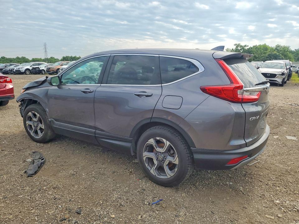 Photo 2 from auction – 2018 HONDA CR-V with VIN 7FARW2H5XJE048842