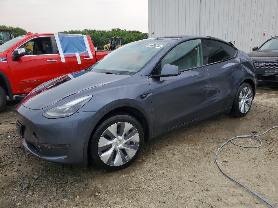 TESLA MODEL Y 2023 with VIN 7SAYGDEE5PF858069 - Photo from auction