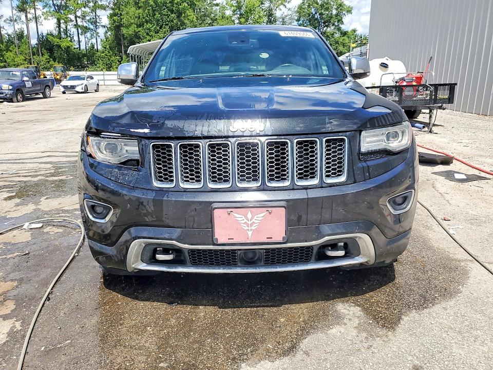Photo 5 from auction – 2014 JEEP GRAND CHEROKEE with VIN 1C4RJFCM9EC580554
