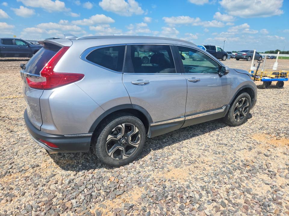 Photo 3 from auction – 2018 HONDA CR-V with VIN 5J6RW2H94JL032397