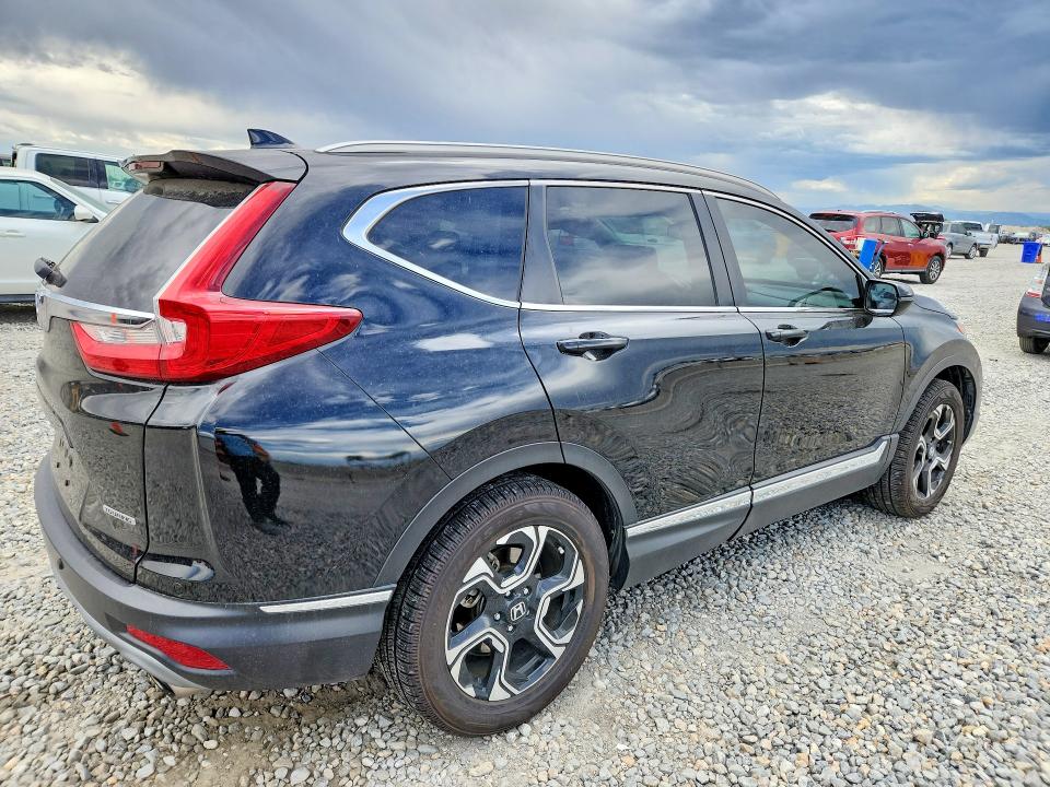 Photo 3 from auction – 2018 HONDA CR-V with VIN 7FARW1H91JE047334