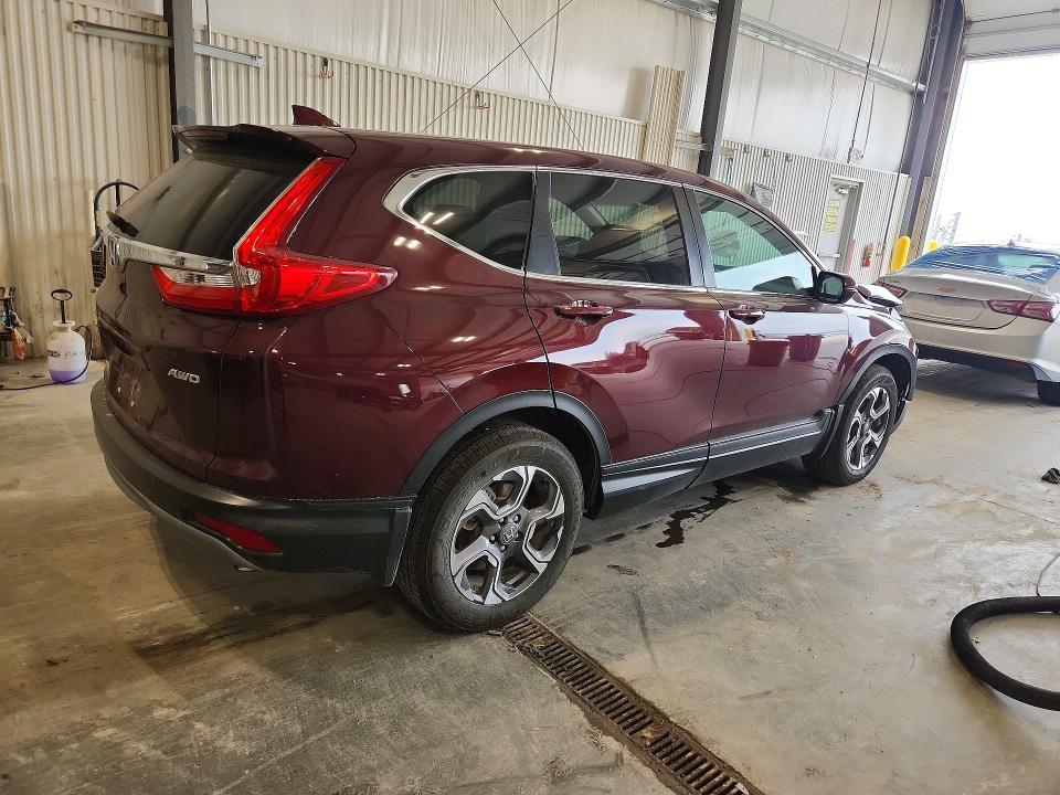 Photo 3 from auction – 2019 HONDA CR-V with VIN 7FARW2H86KE002274