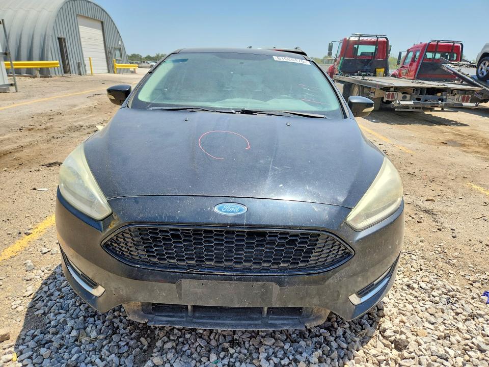 Photo 5 from auction – 2016 FORD FOCUS with VIN 1FADP3N25GL256223