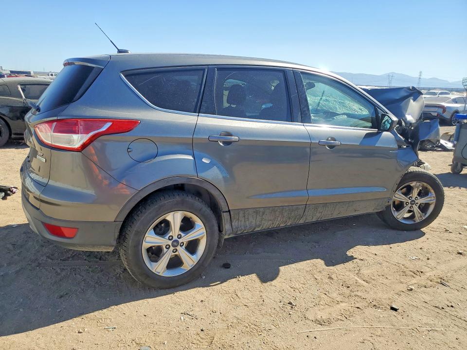 Photo 3 from auction – 2014 FORD ESCAPE with VIN 1FMCU0GX7EUD72547