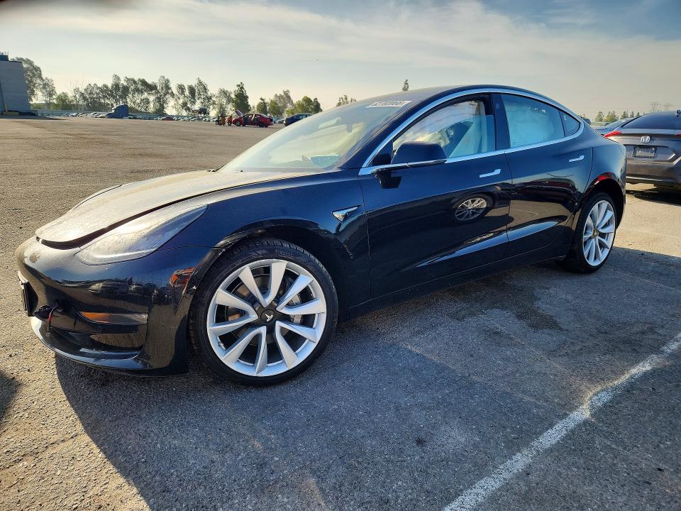 TESLA MODEL 3 2018 with VIN 5YJ3E1EA0JF154572 - Photo from auction