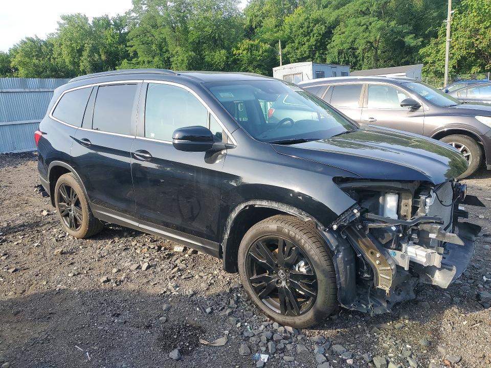 Photo 4 from auction – 2022 HONDA PILOT with VIN 5FNYF6H21NB079794
