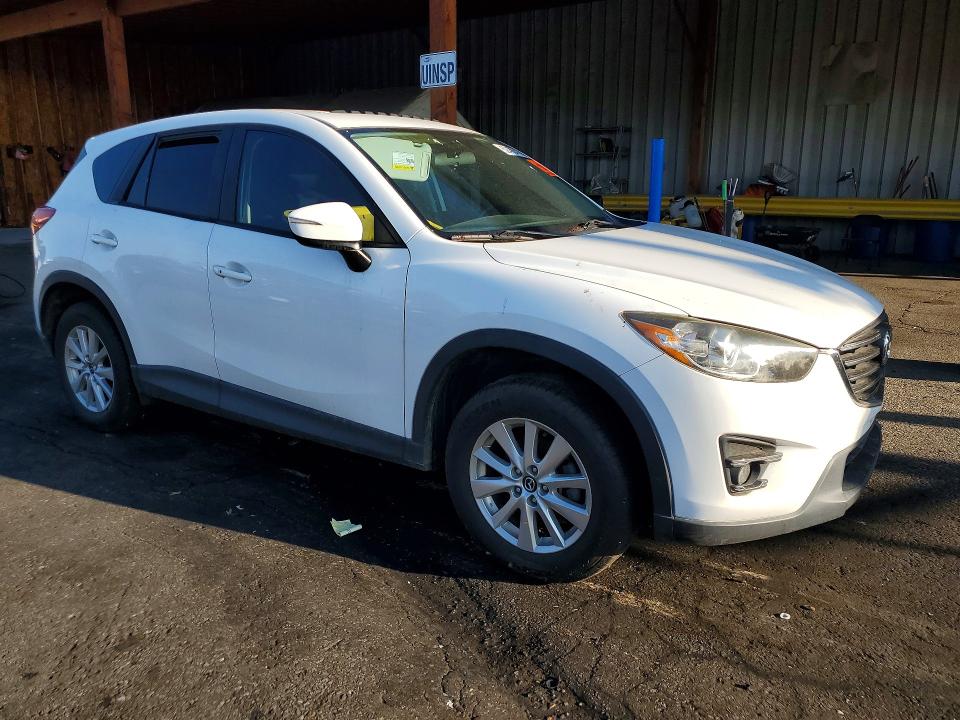 Photo 4 from auction – 2016 MAZDA CX-5 with VIN JM3KE2CY9G0800532