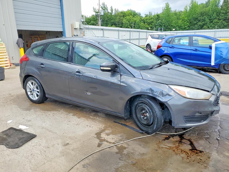Photo 4 from auction – 2015 FORD FOCUS with VIN 1FADP3K25FL203220