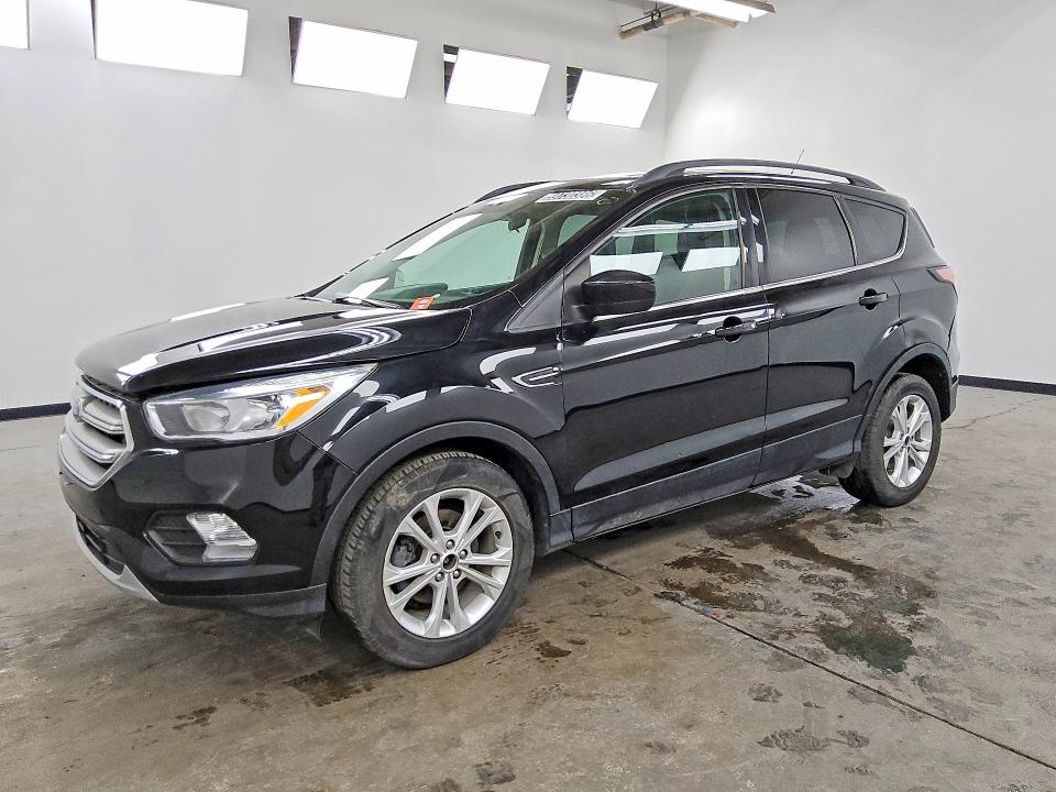 FORD ESCAPE 2018 with VIN 1FMCU0GD2JUC11023 - Photo from auction