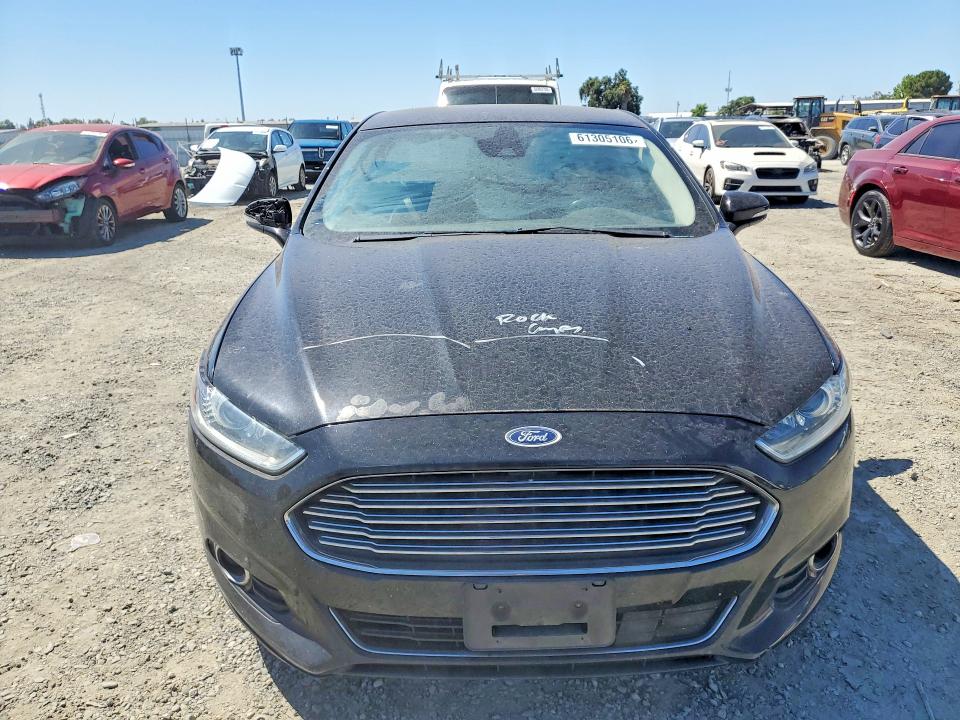 Photo 5 from auction – 2016 FORD FUSION with VIN 3FA6P0PU4GR115831