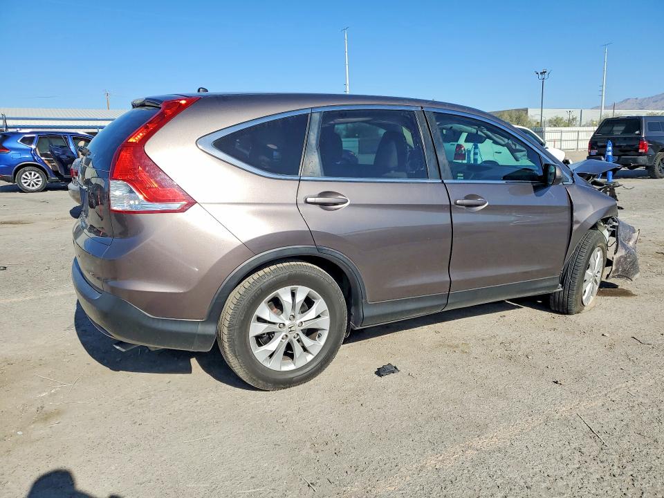 Photo 3 from auction – 2014 HONDA CR-V with VIN 3CZRM3H56EG704925