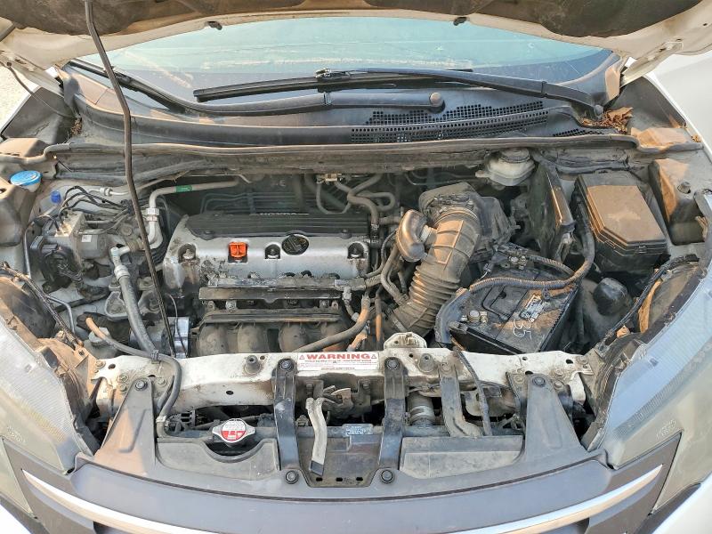 Photo 12 from auction – 2014 HONDA CR-V with VIN 5J6RM4H73EL090216