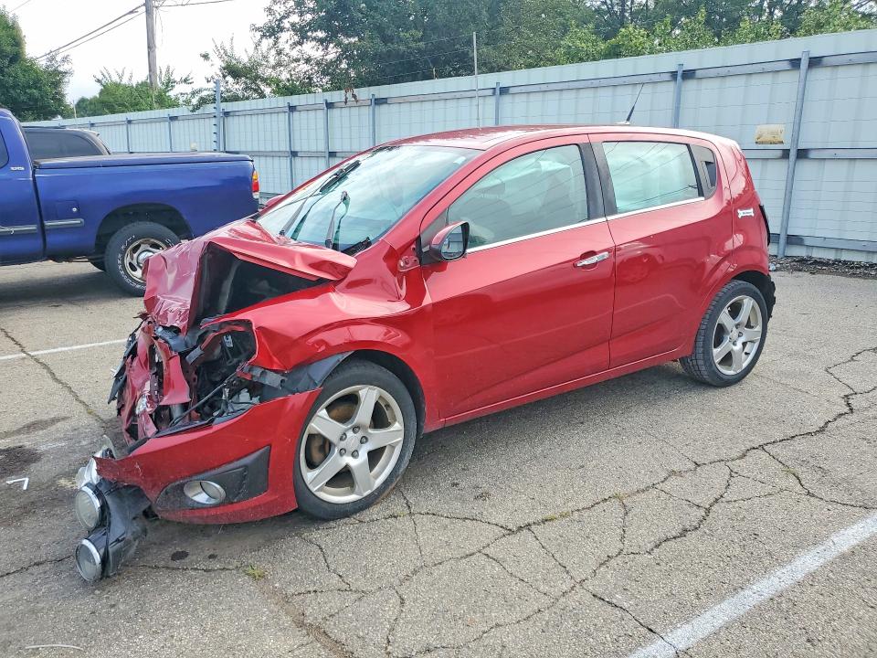 CHEVROLET SONIC 2014 with VIN 1G1JE6SB1E4220277 - Photo from auction