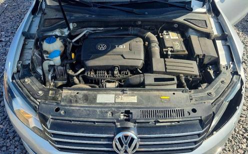 Photo 11 from auction – 2015 VOLKSWAGEN PASSAT with VIN 1VWAT7A38FC121554