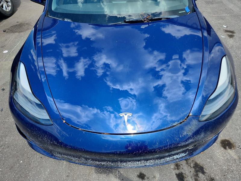 Photo 11 from auction – 2022 TESLA MODEL 3 with VIN 5YJ3E1EA9NF368661