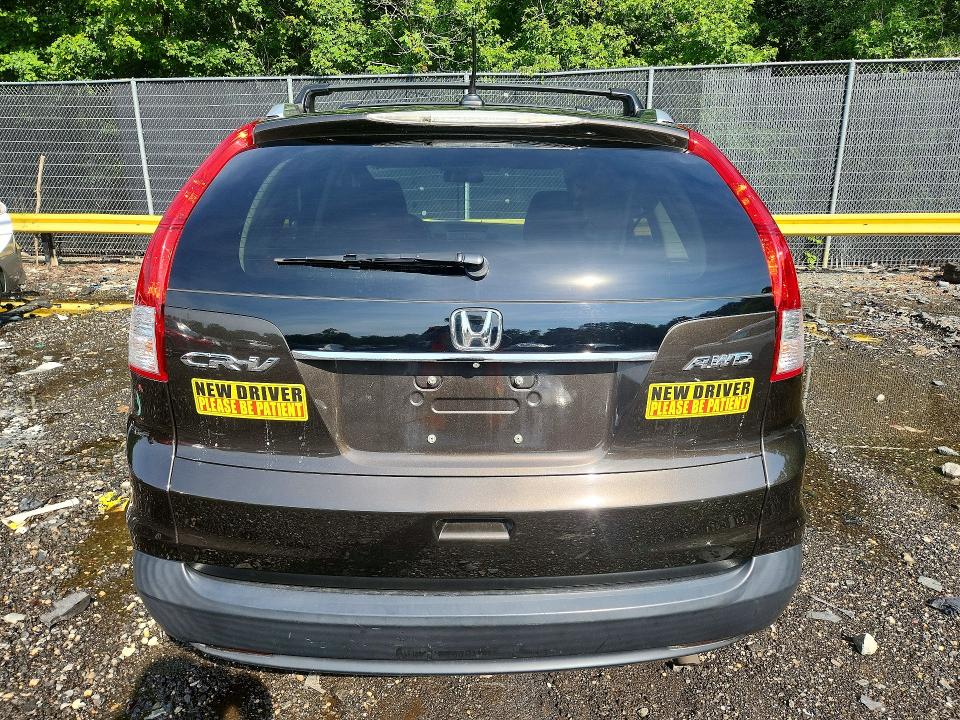 Photo 6 from auction – 2014 HONDA CR-V with VIN 2HKRM4H75EH677835