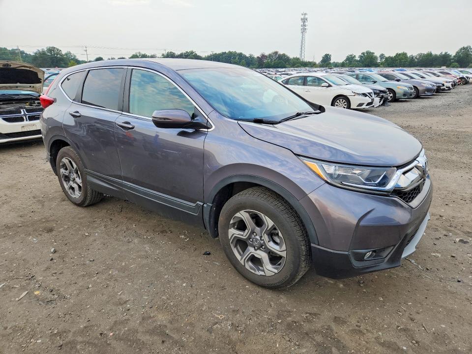 Photo 4 from auction – 2018 HONDA CR-V with VIN 7FARW2H84JE082642