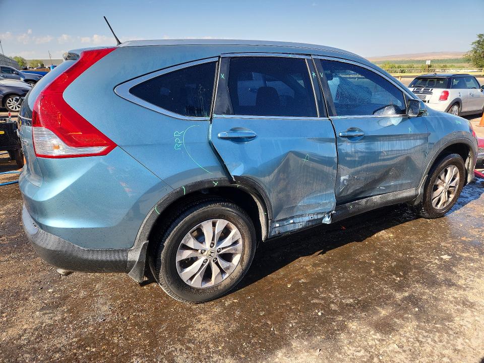 Photo 3 from auction – 2014 HONDA CR-V with VIN 2HKRM4H74EH656491