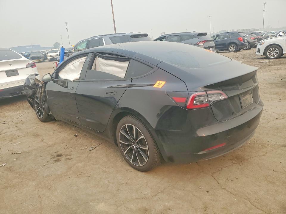 Photo 2 from auction – 2023 TESLA MODEL 3 with VIN 5YJ3E1EB3PF390943