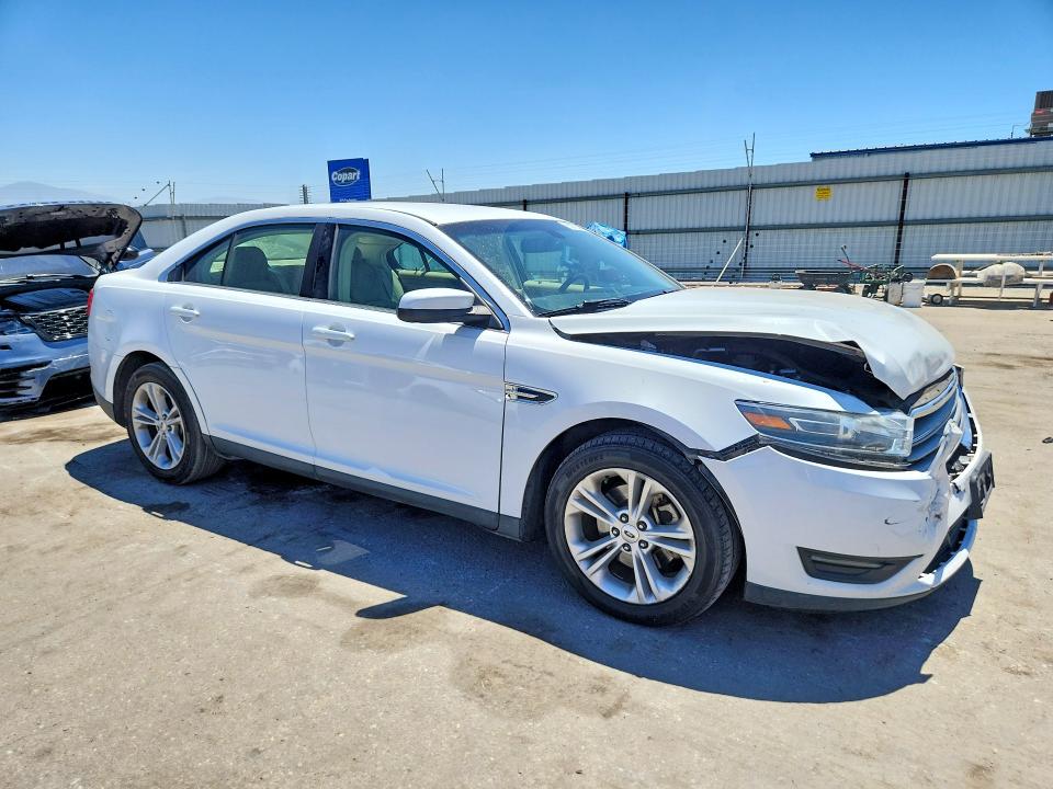 Photo 4 from auction – 2015 FORD TAURUS with VIN 1FAHP2E84FG173003