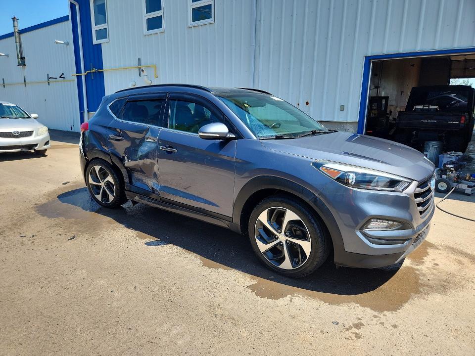 Photo 4 from auction – 2016 HYUNDAI TUCSON with VIN KM8J3CA22GU033884