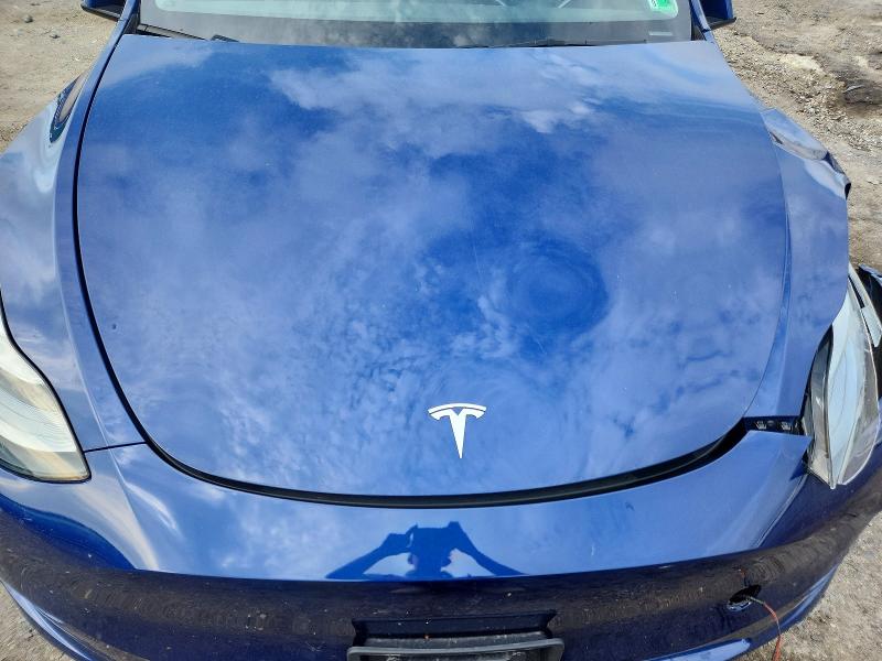Photo 12 from auction – 2023 TESLA MODEL Y with VIN 7SAYGAEE4PF879140