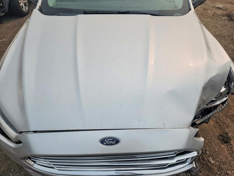 Photo 11 from auction – 2016 FORD FUSION with VIN 3FA6P0G72GR299337