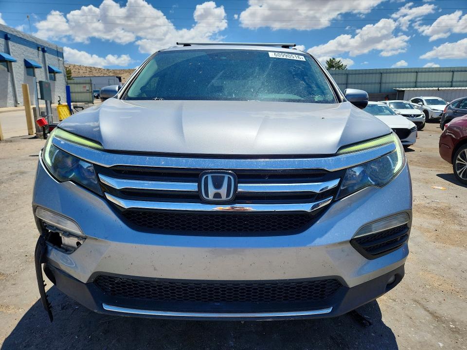 Photo 5 from auction – 2017 HONDA PILOT with VIN 5FNYF6H07HB003192