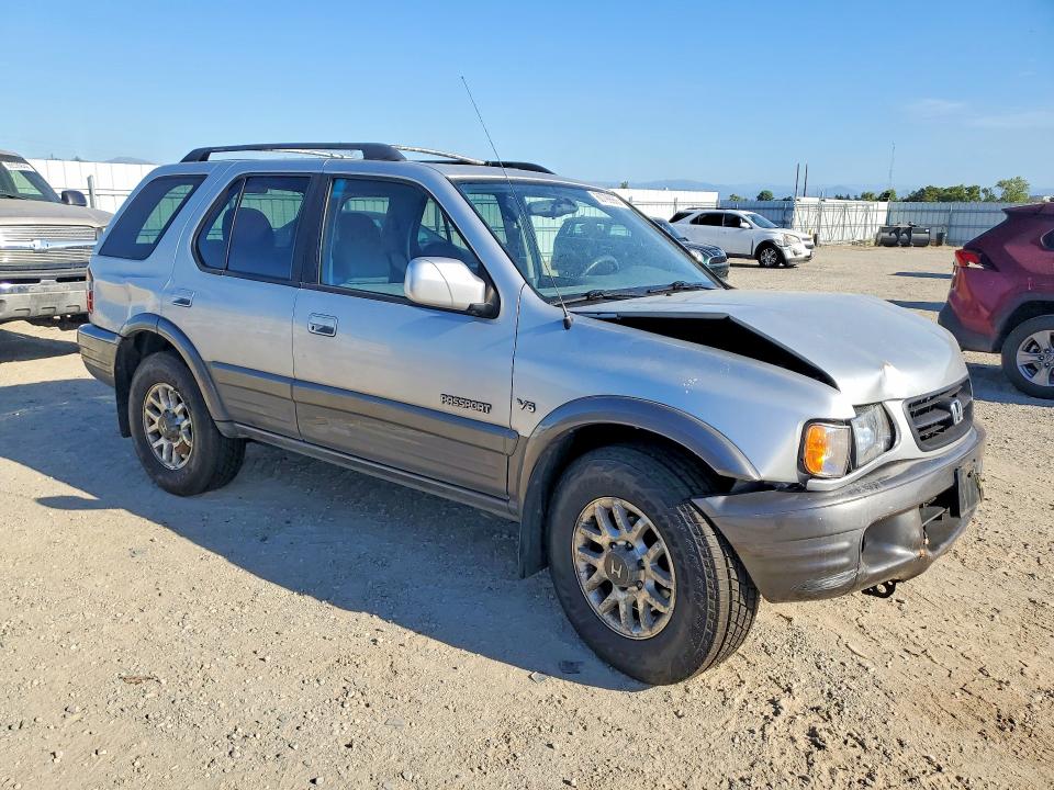 Photo 4 from auction – 2000 HONDA PASSPORT with VIN 4S6DM58W7Y4406635