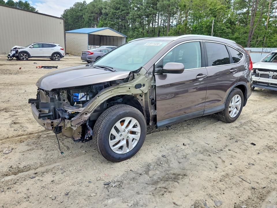 HONDA CR-V 2015 with VIN 2HKRM4H73FH617019 - Photo from auction