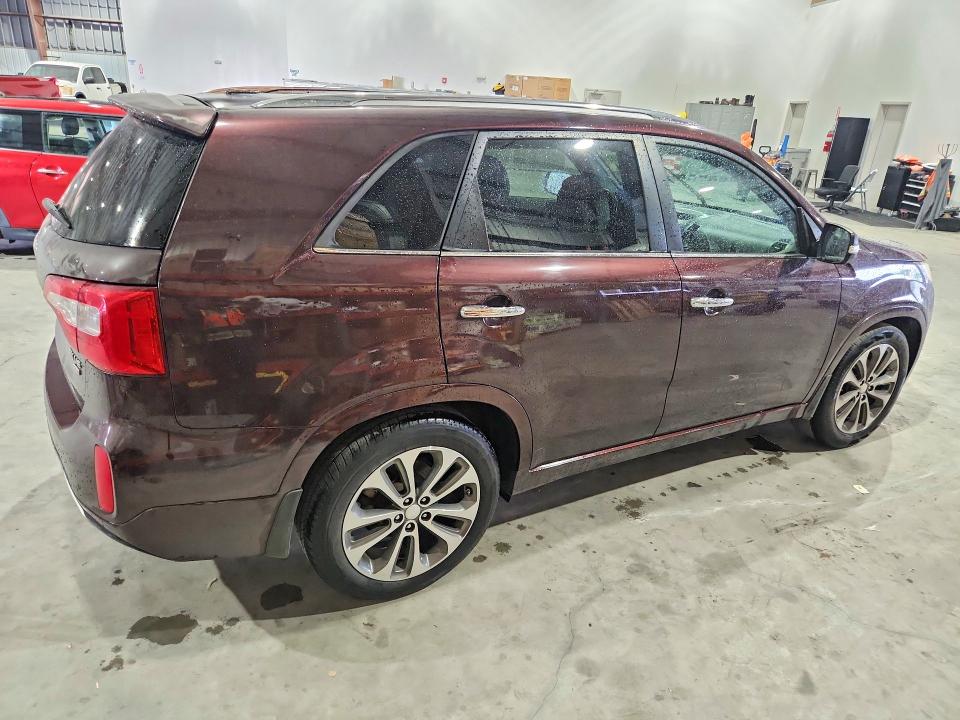 Photo 3 from auction – 2014 KIA SORENTO with VIN 5XYKW4A77EG480212
