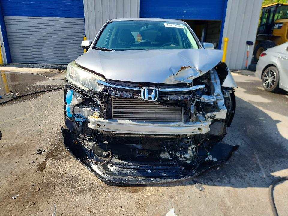 Photo 5 from auction – 2016 HONDA CR-V with VIN 2HKRM4H54GH660218
