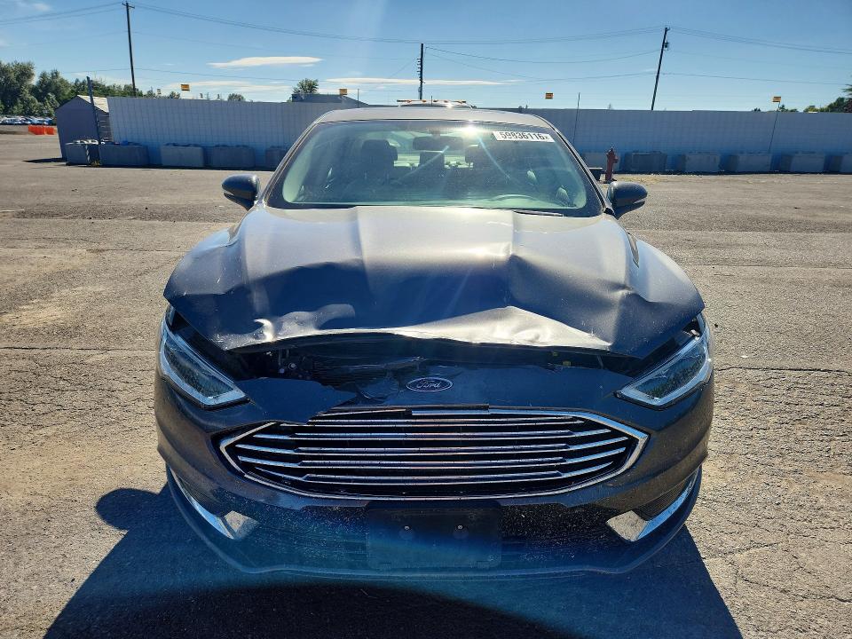 Photo 5 from auction – 2018 FORD FUSION with VIN 3FA6P0LUXJR205420