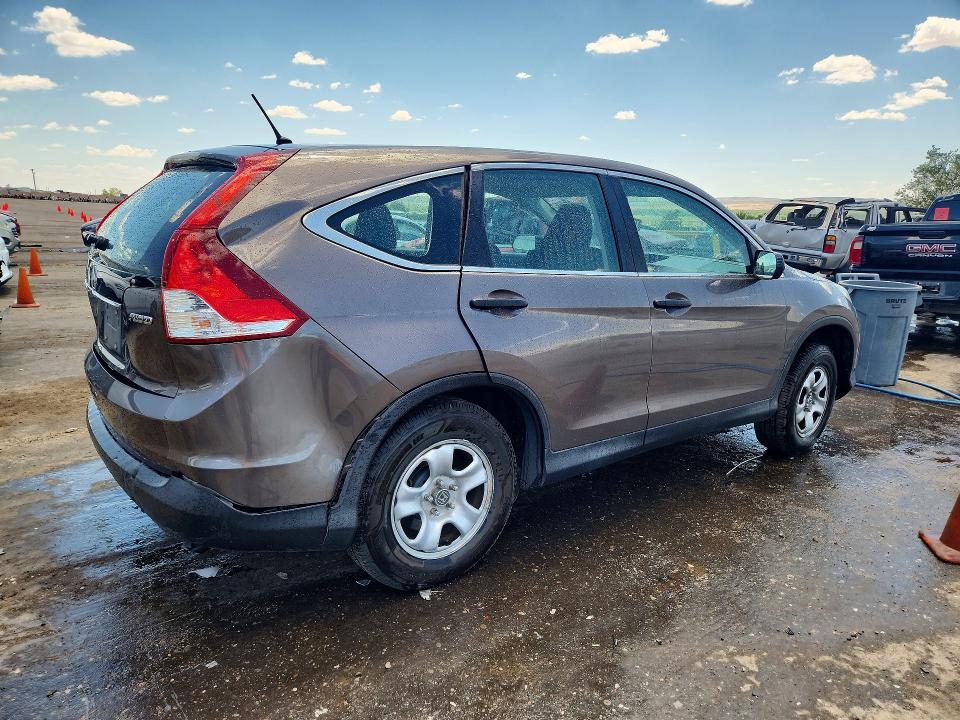 Photo 3 from auction – 2014 HONDA CR-V with VIN 2HKRM4H33EH714068