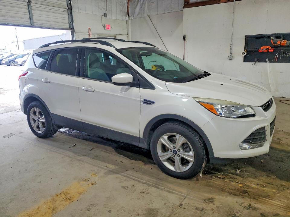 Photo 4 from auction – 2016 FORD ESCAPE with VIN 1FMCU9G9XGUA74373